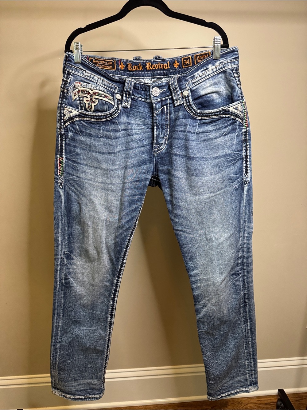 Rock Revival Distressed Light Blue Boyfriend Jeans with Embroidered Pockets